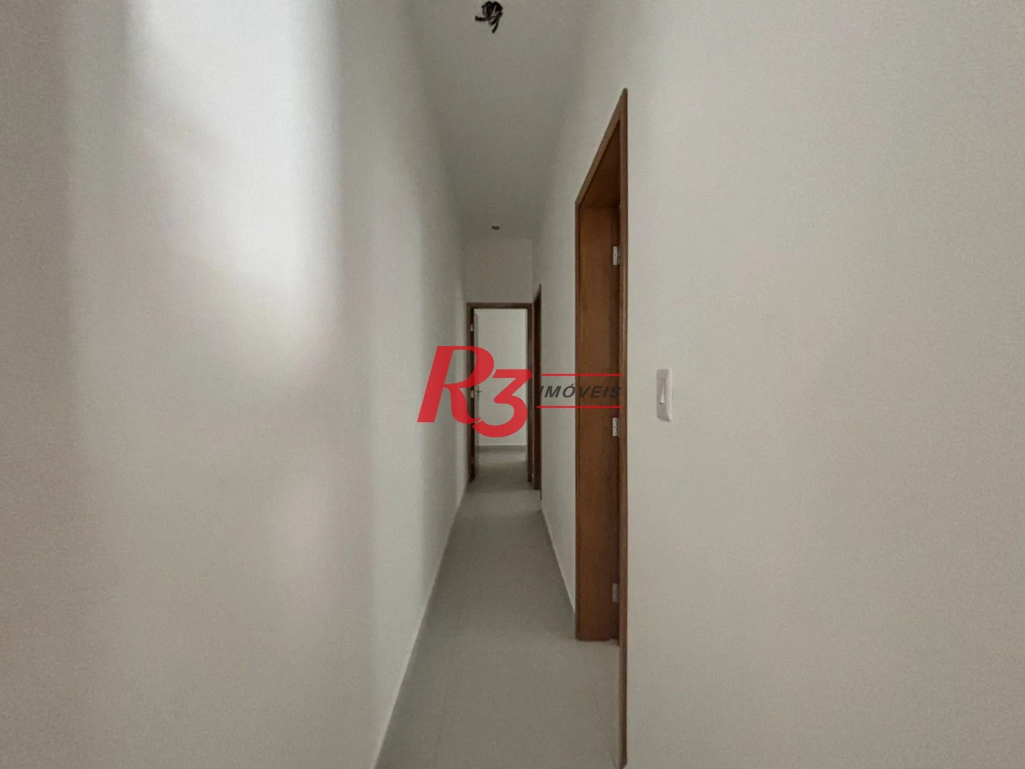 Casa com 3 dormitórios à venda, 115 m² por R$ 1.100.000,00 - Aparecida - Santos/SP