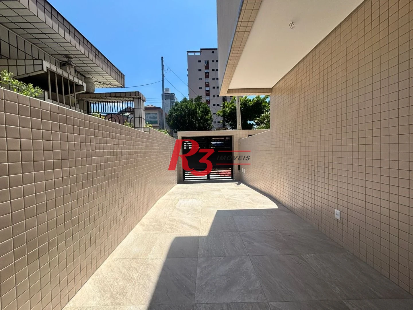 Casa com 3 dormitórios à venda, 115 m² por R$ 1.100.000,00 - Aparecida - Santos/SP