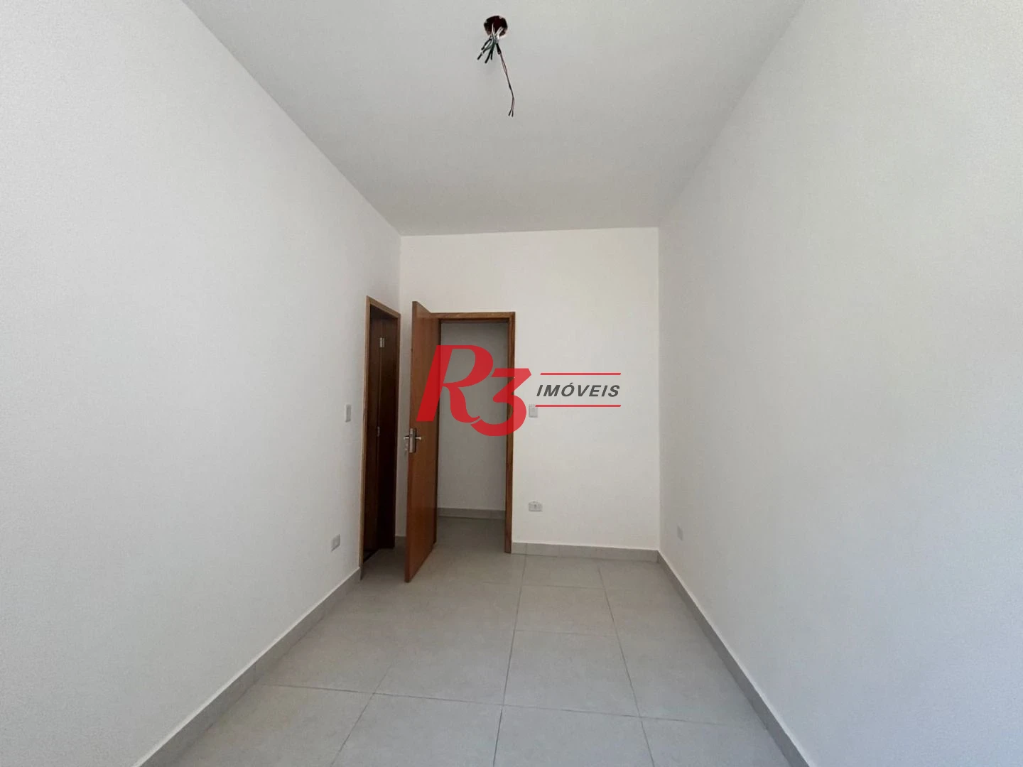 Casa com 3 dormitórios à venda, 115 m² por R$ 1.100.000,00 - Aparecida - Santos/SP