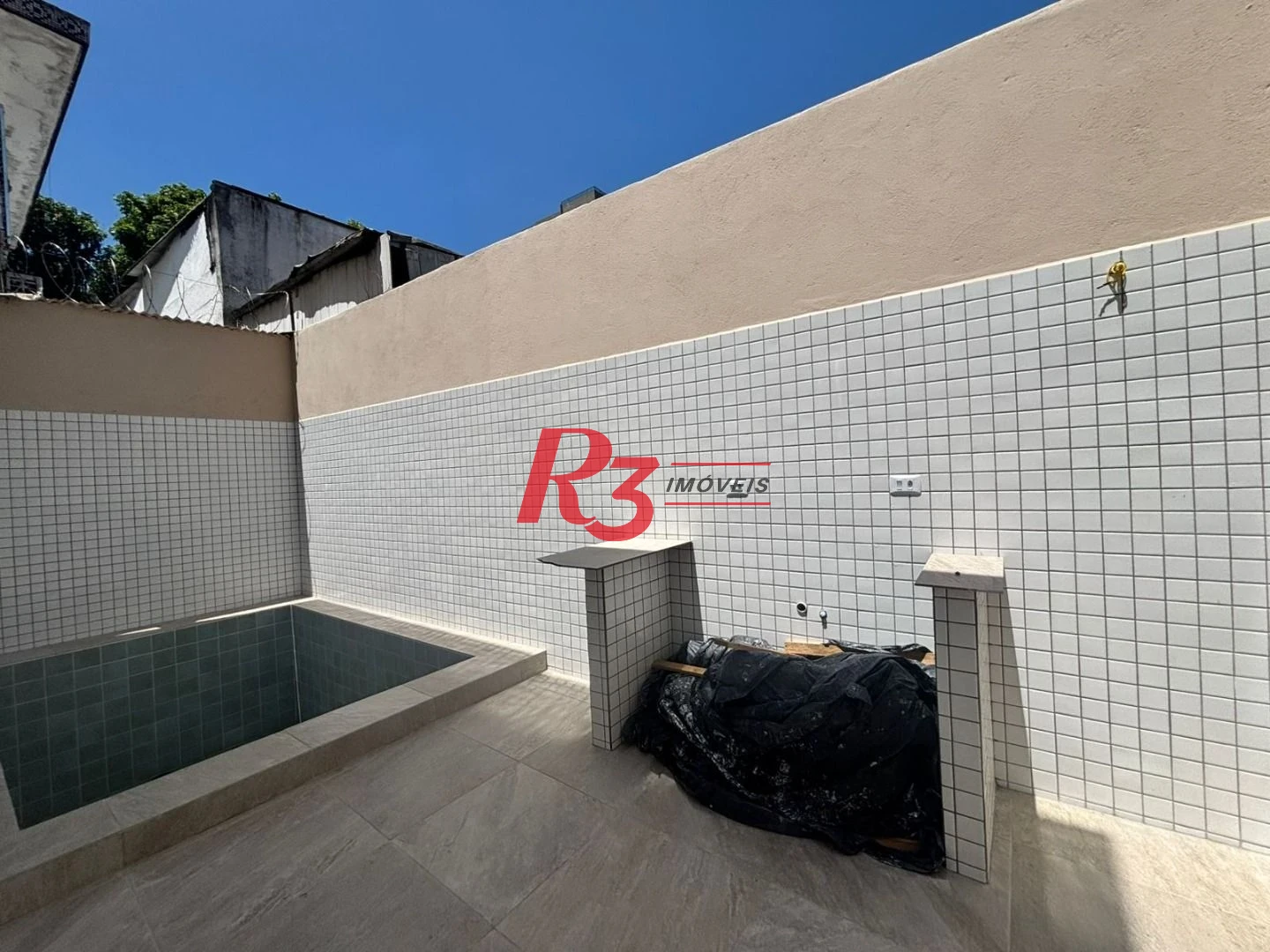 Casa com 3 dormitórios à venda, 115 m² por R$ 1.100.000,00 - Aparecida - Santos/SP