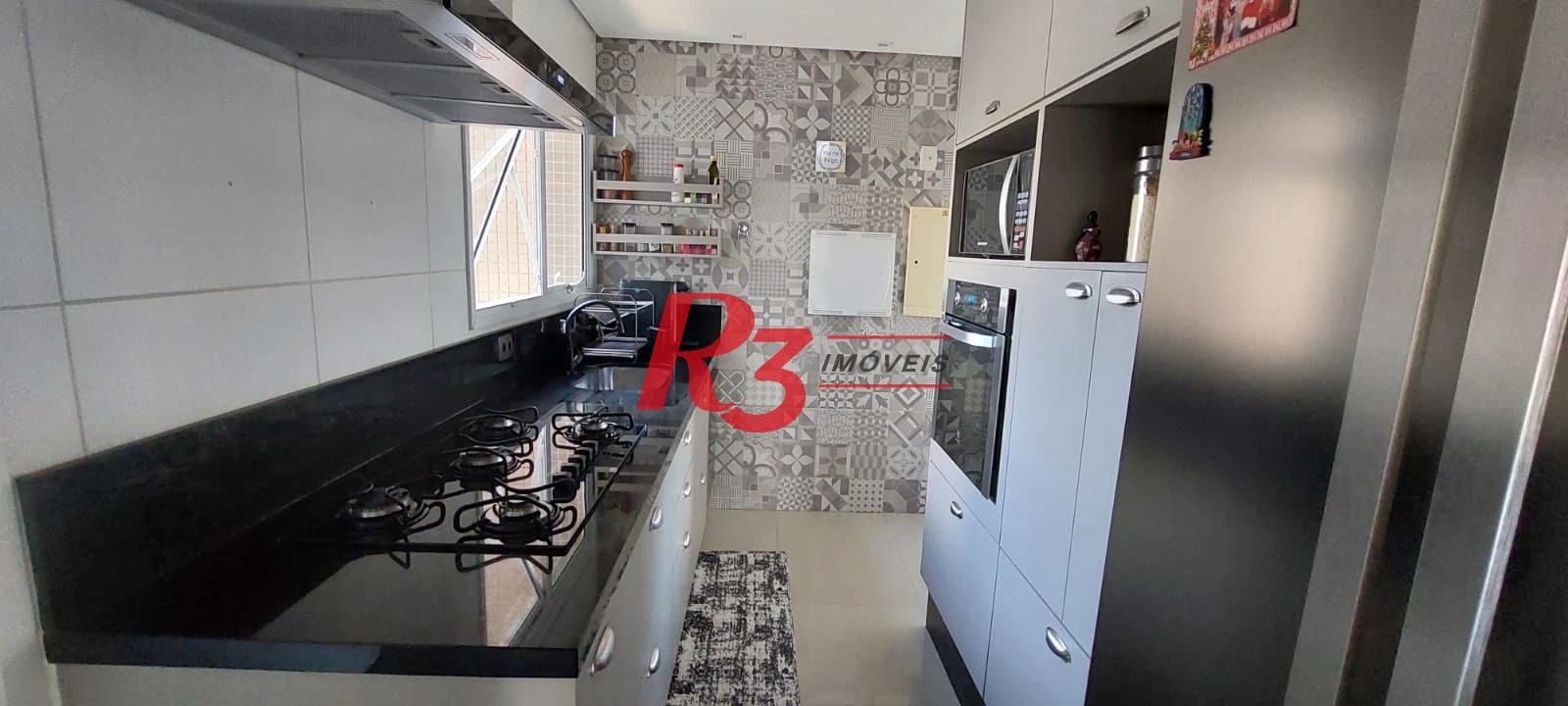 Apartamento com 3 dormitórios à venda, 100 m² por R$ 1.370.000,00 - José Menino - Santos/SP
