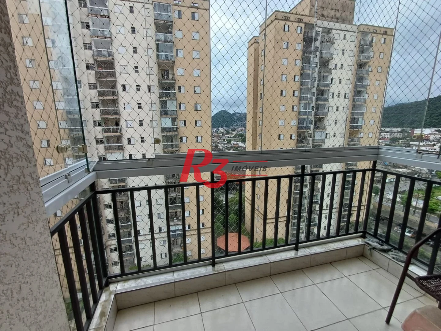Apartamento com 3 dormitórios à venda, 69 m² por R$ 455.800,00 - Areia Branca - Santos/SP