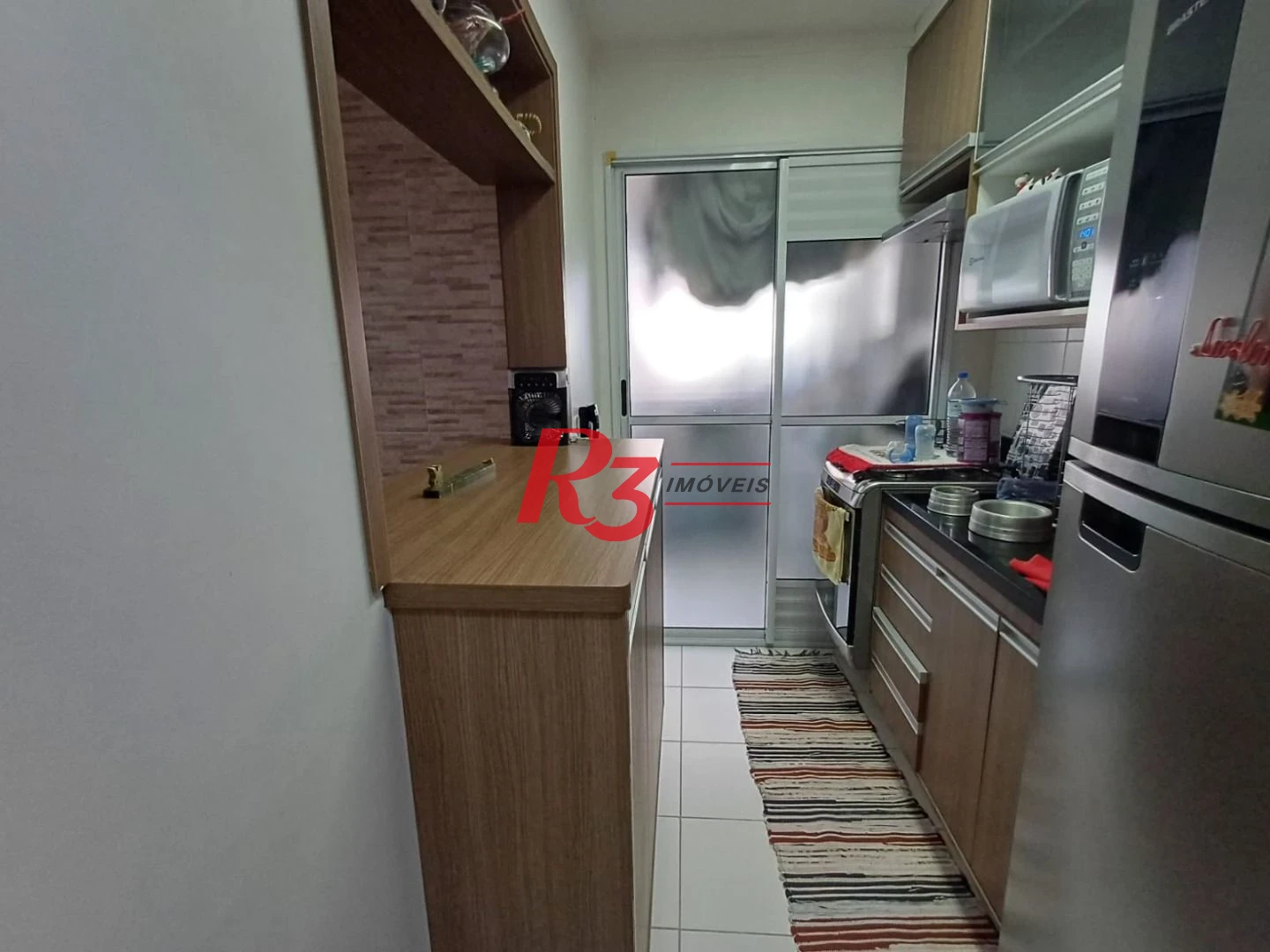 Apartamento com 3 dormitórios à venda, 69 m² por R$ 455.800,00 - Areia Branca - Santos/SP