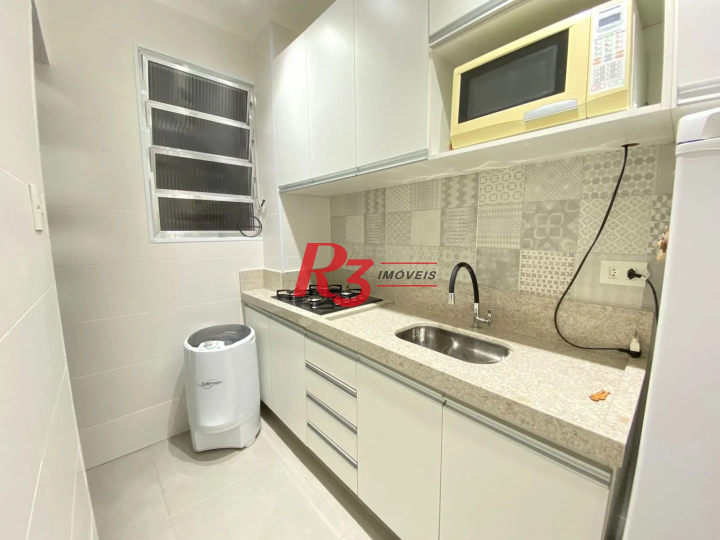 Kitnet com 1 dormitório, 38 m² - venda por R$ 300.000,00 ou aluguel por R$ 3.000,00/mês - Centro - São Vicente/SP
