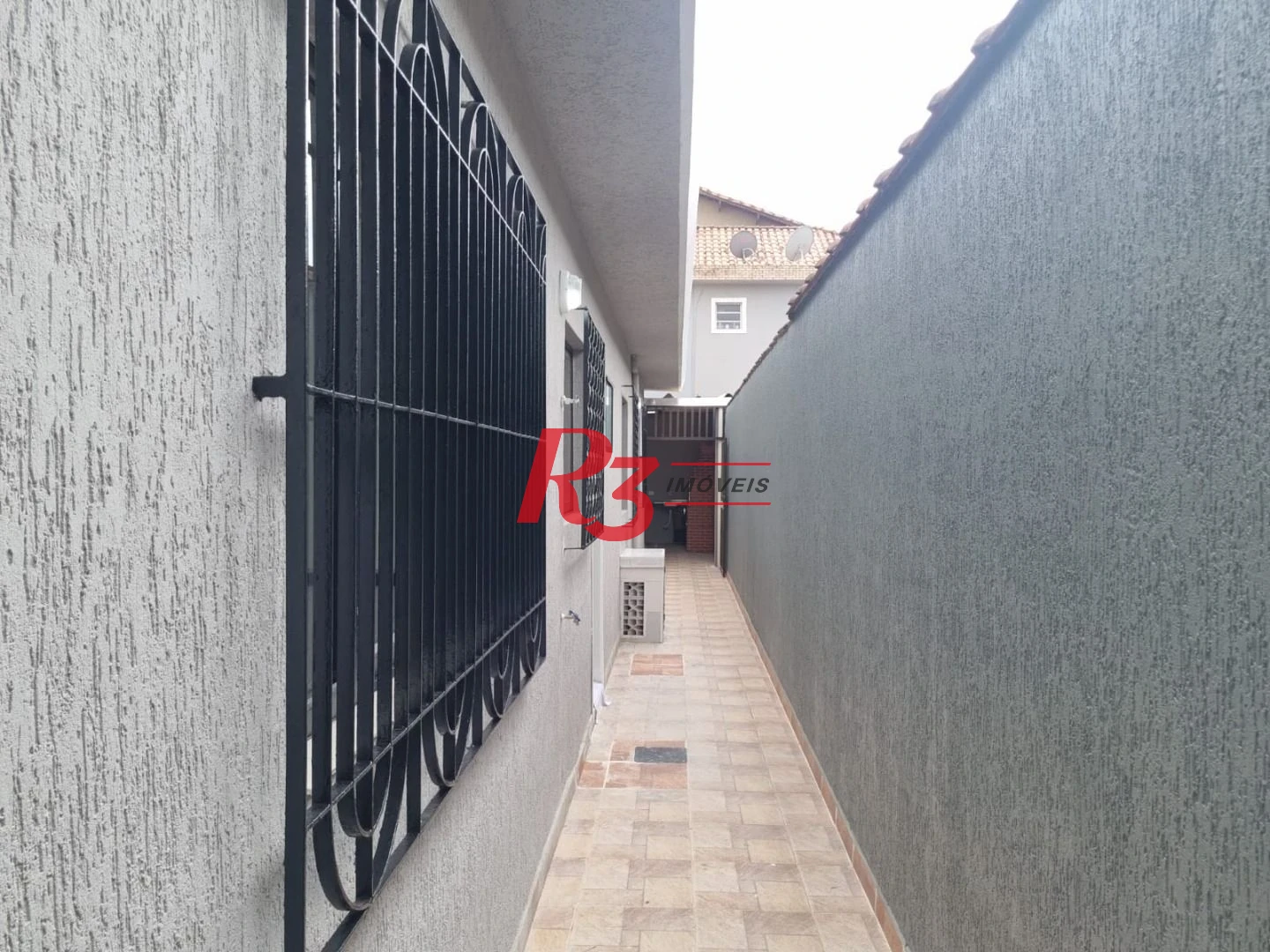 Casa com 3 dormitórios à venda, 150 m² por R$ 532.000,00 - Vila São Jorge - São Vicente/SP
