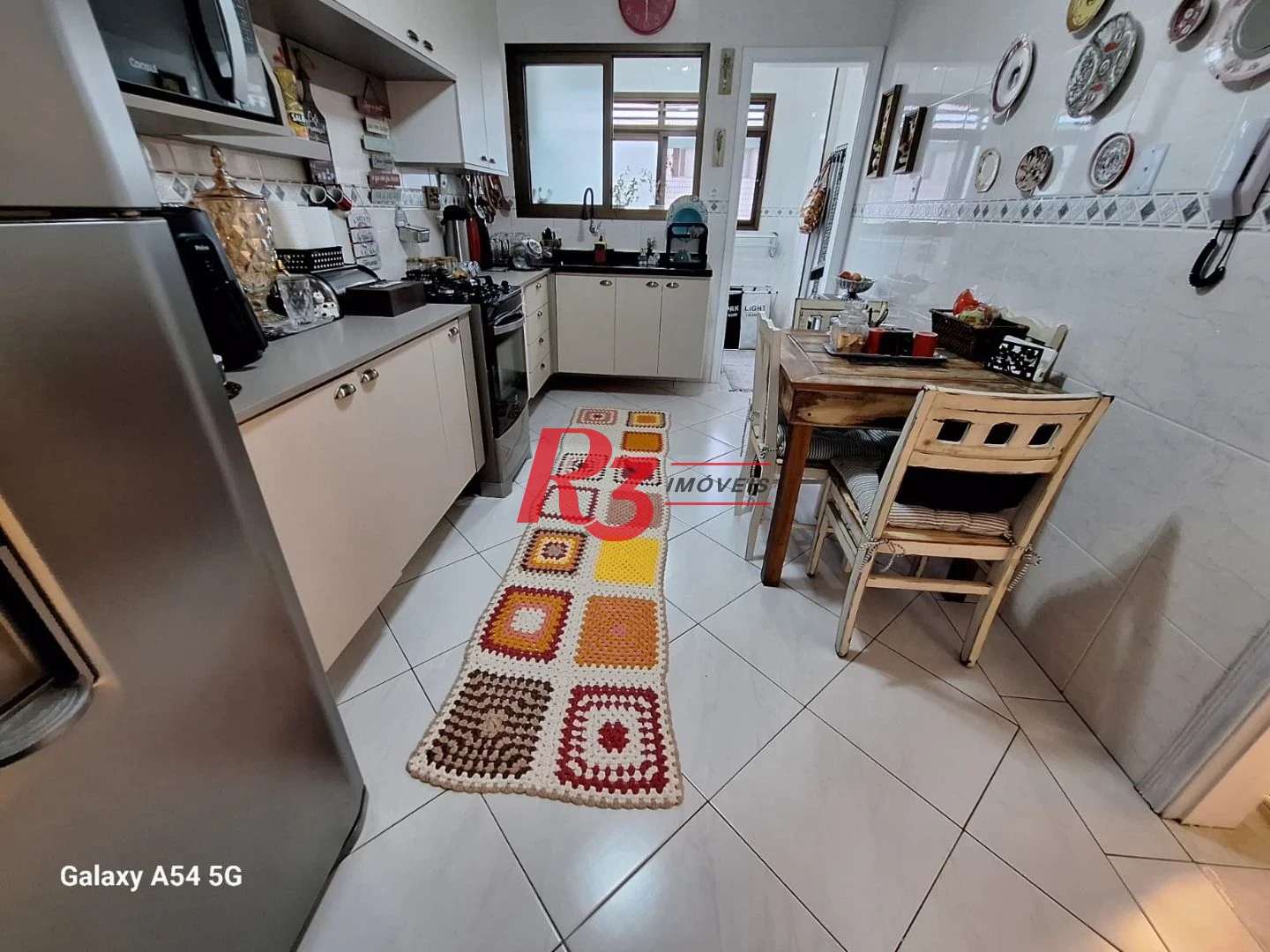 Apartamento com 2 dormitórios à venda, 96 m² por R$ 606.000,00 - Vila Guilhermina - Praia Grande/SP