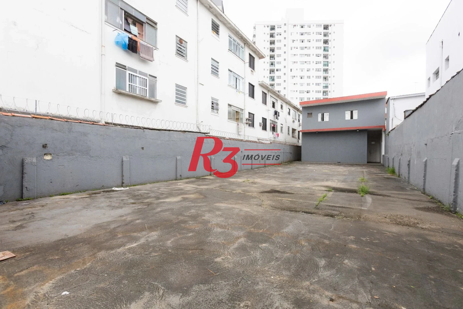 Terreno para alugar, 470 m² por R$ 13.500/mês - Macuco - Santos/SP