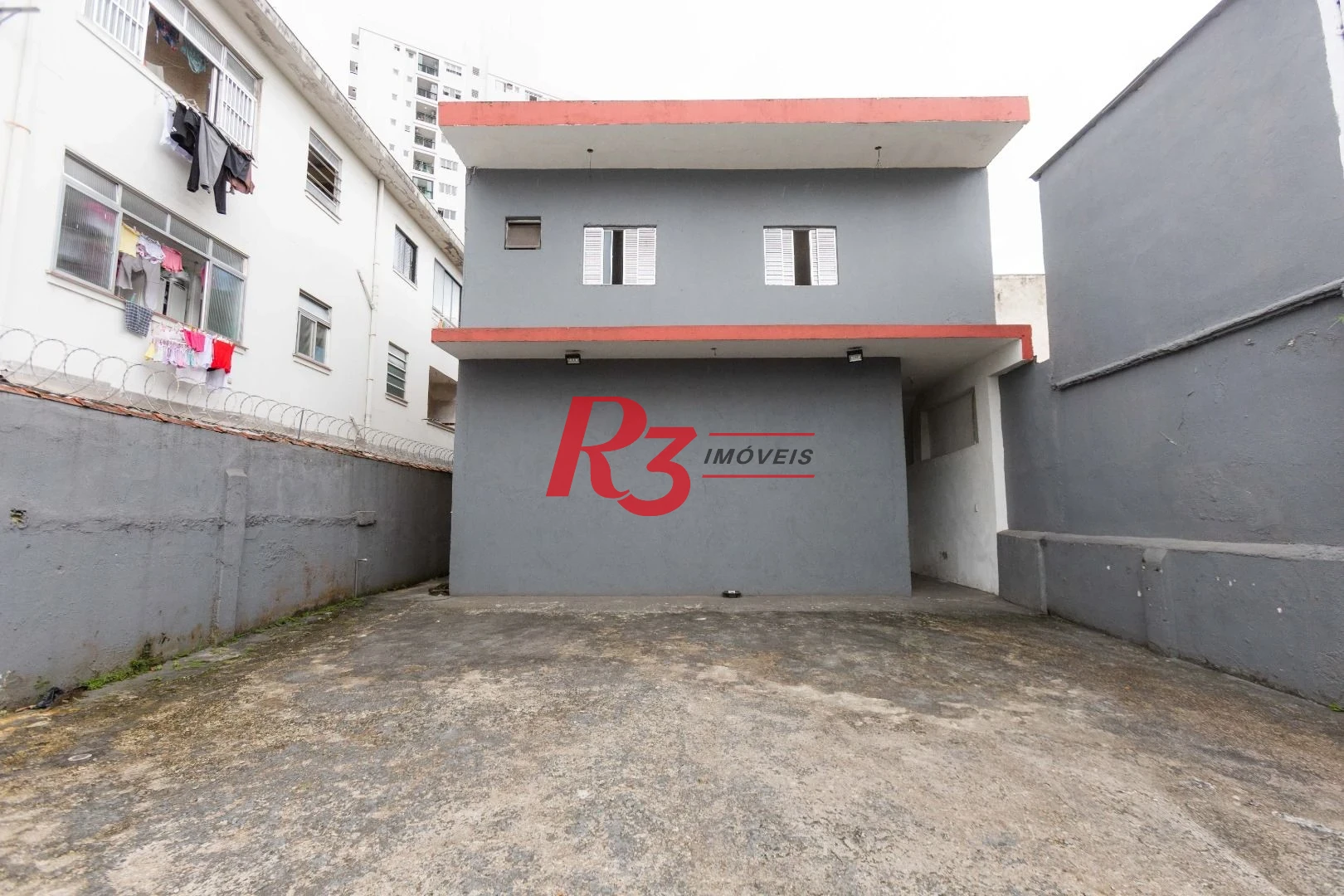Terreno para alugar, 470 m² por R$ 13.500/mês - Macuco - Santos/SP