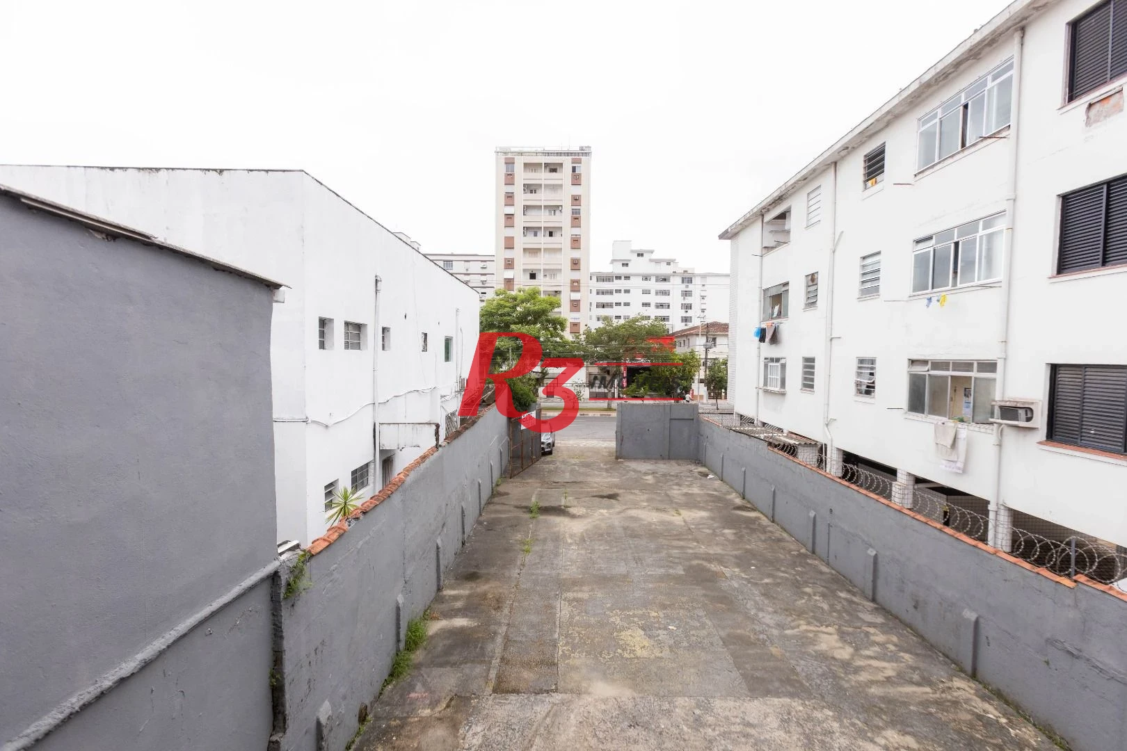 Terreno para alugar, 470 m² por R$ 13.500/mês - Macuco - Santos/SP