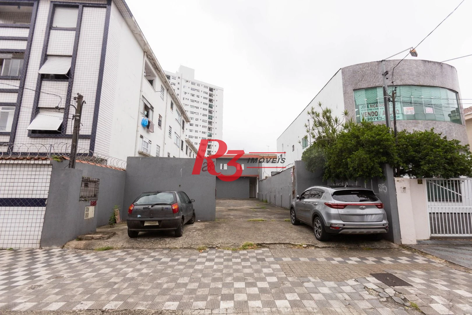 Terreno para alugar, 470 m² por R$ 13.500/mês - Macuco - Santos/SP