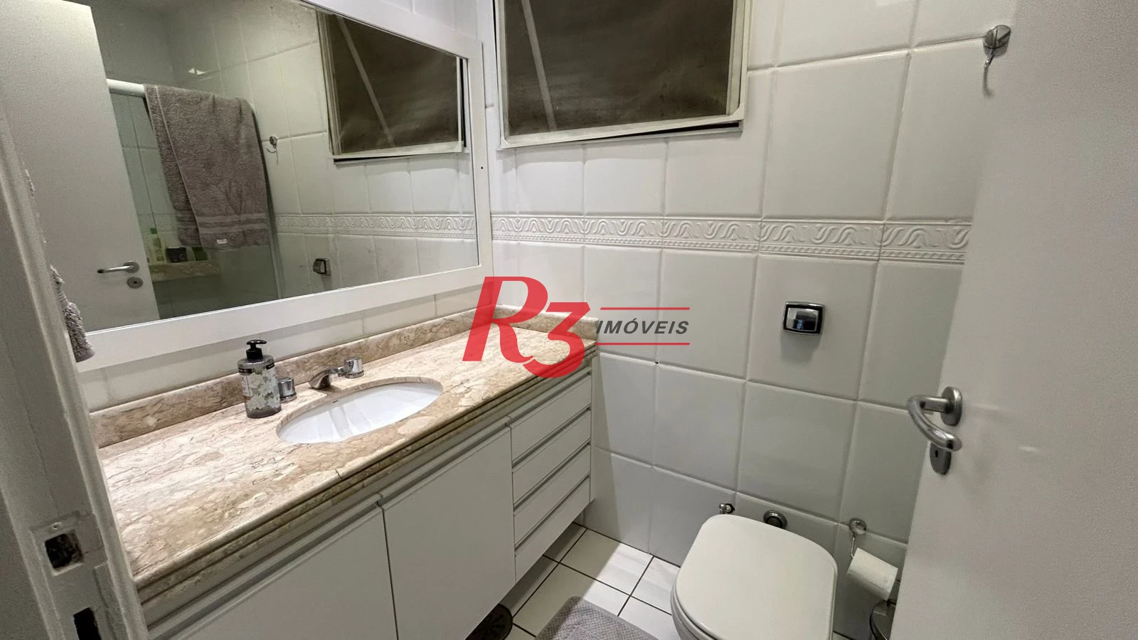 Apartamento com 2 dormitórios à venda, 80 m² por R$ 1.100.000,00 - Gonzaga - Santos/SP