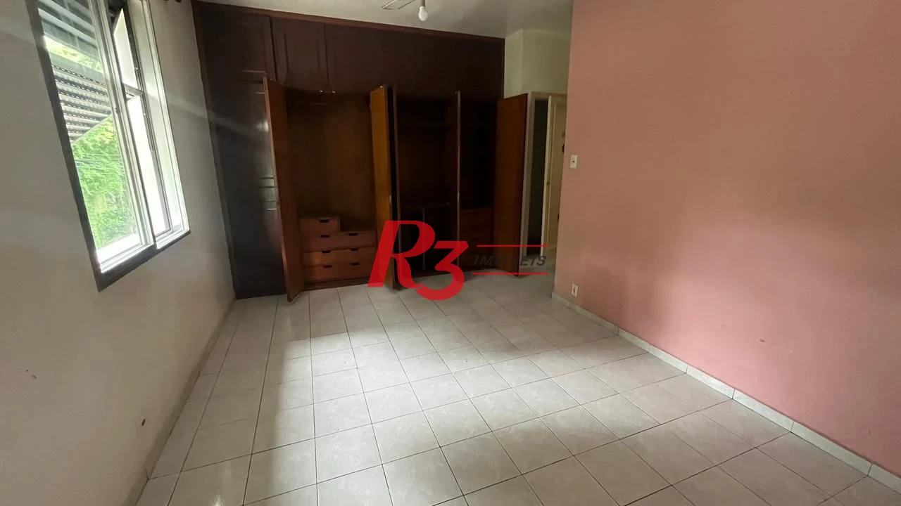 Sobrado com 3 dormitórios à venda, 107 m² por R$ 580.000,00 - Encruzilhada - Santos/SP