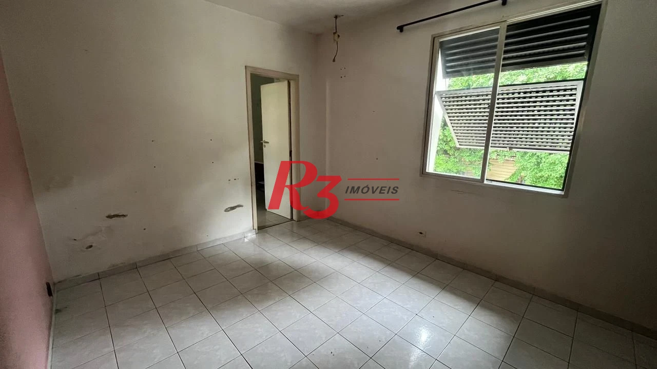 Sobrado com 3 dormitórios à venda, 107 m² por R$ 580.000,00 - Encruzilhada - Santos/SP