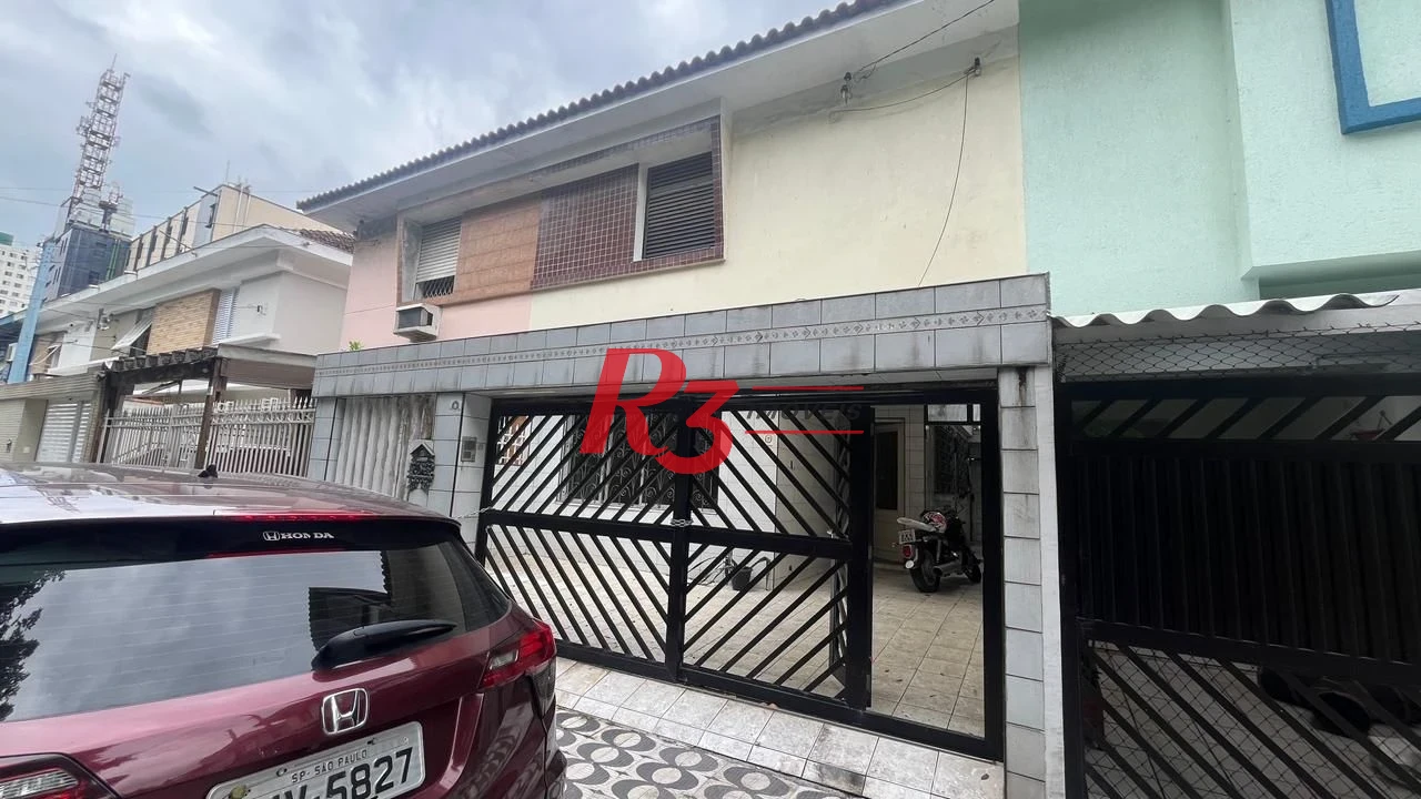 Sobrado com 3 dormitórios à venda, 107 m² por R$ 580.000,00 - Encruzilhada - Santos/SP