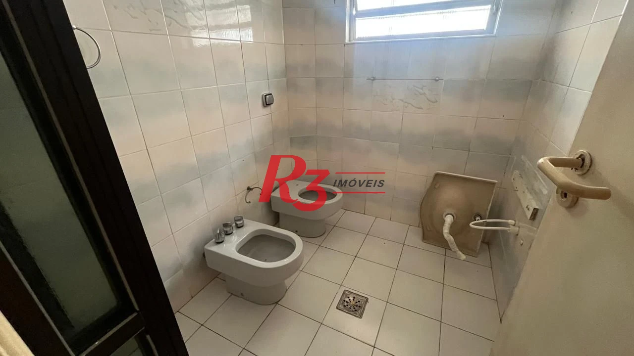 Sobrado com 3 dormitórios à venda, 107 m² por R$ 580.000,00 - Encruzilhada - Santos/SP