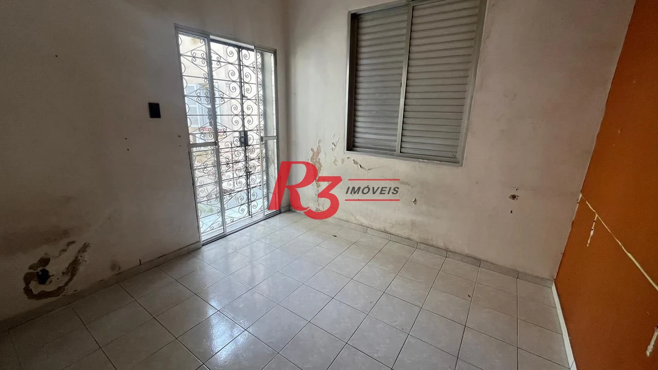 Sobrado com 3 dormitórios à venda, 107 m² por R$ 580.000,00 - Encruzilhada - Santos/SP