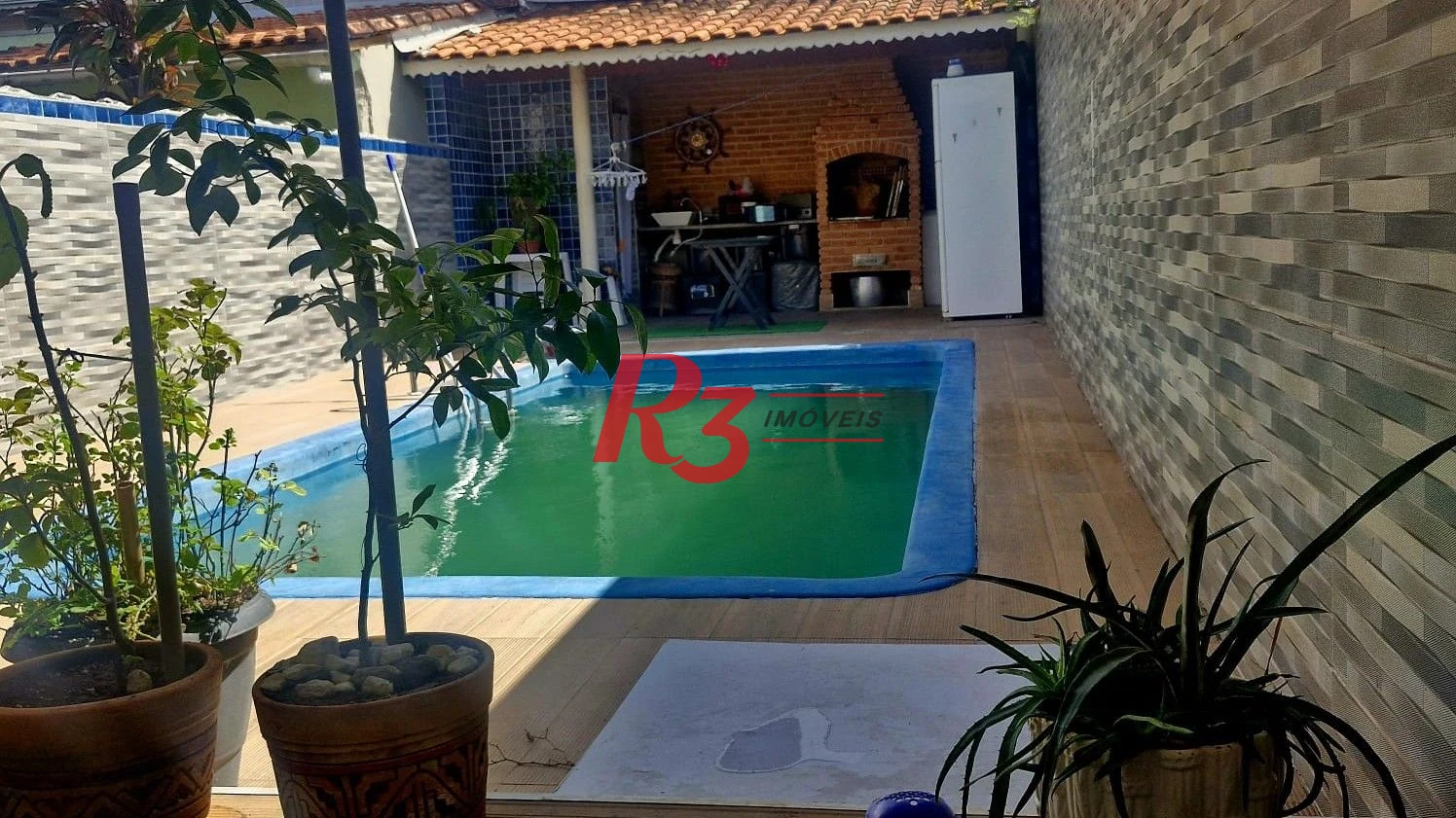 Casa com 3 dormitórios à venda, 385 m² por R$ 1.300.000,00 - Vila Guilhermina - Praia Grande/SP