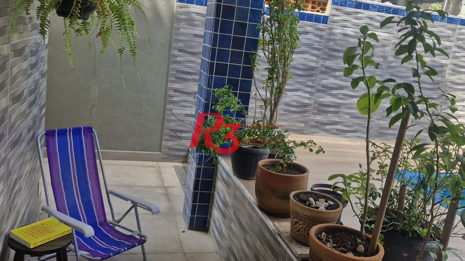 Casa com 3 dormitórios à venda, 385 m² por R$ 1.300.000,00 - Vila Guilhermina - Praia Grande/SP