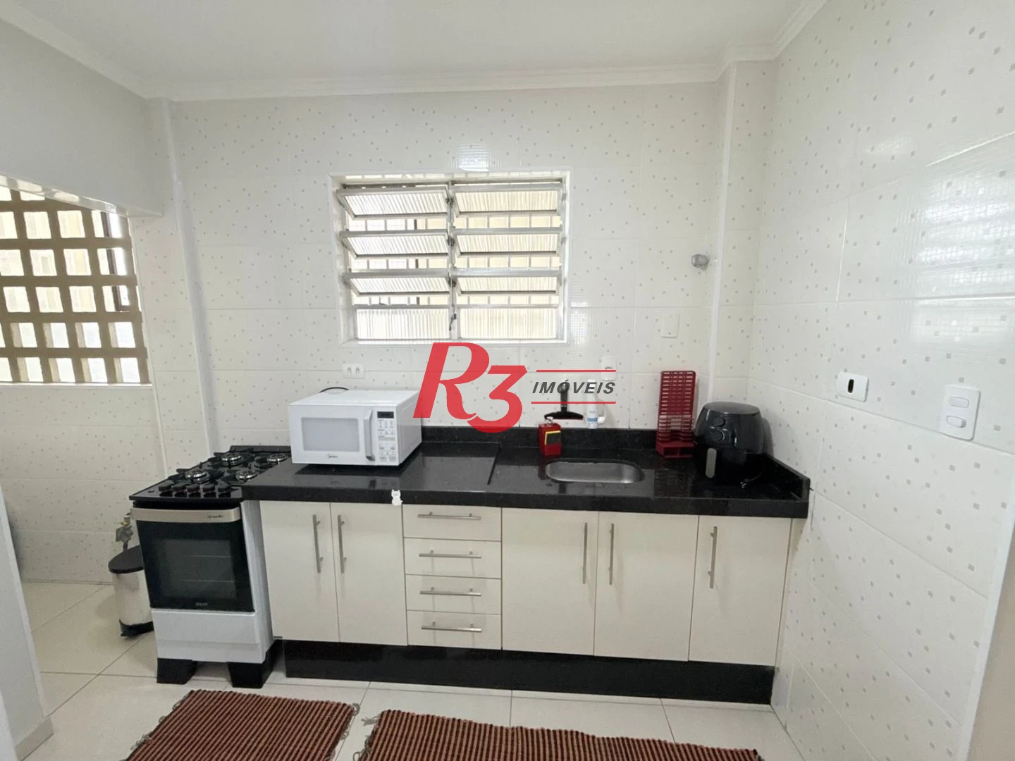 Apartamento com 1 dormitório à venda, 60 m² por R$ 600.000,00 - Gonzaga - Santos/SP