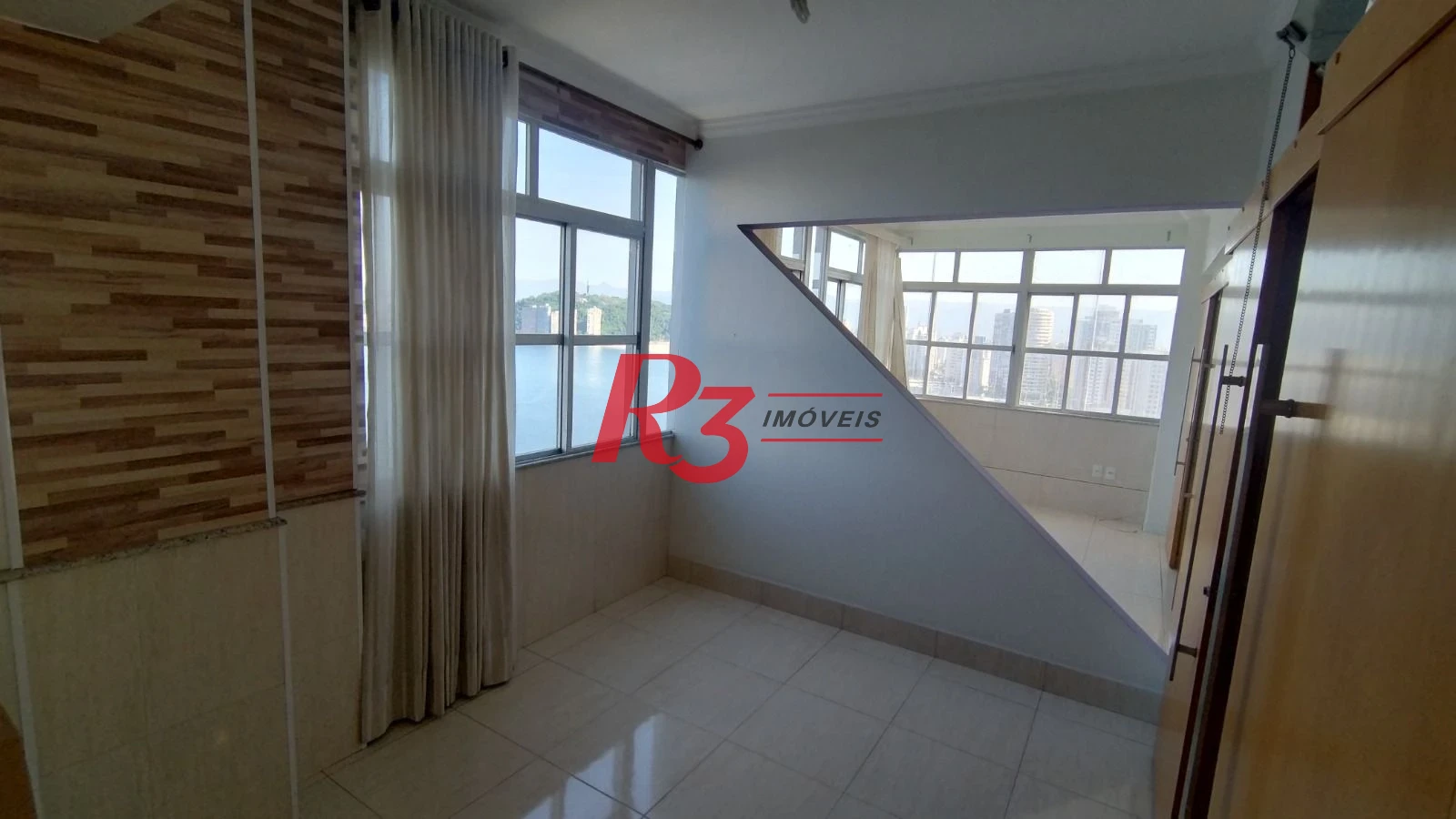 Apartamento com 4 dormitórios à venda, 274 m² por R$ 900.000,00 - Itararé - São Vicente/SP