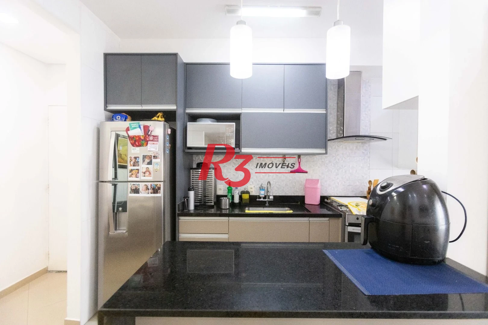 Apartamento com 2 dormitórios à venda, 64 m² por R$ 640.000,00 - Estuário - Santos/SP