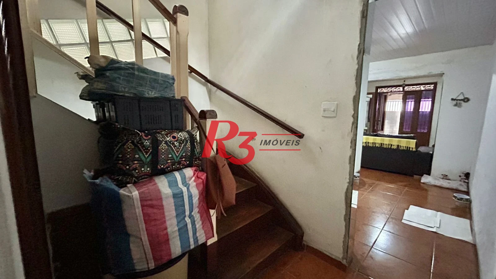 Sobrado com 3 dormitórios à venda, 121 m² por R$ 480.000,00 - Macuco - Santos/SP