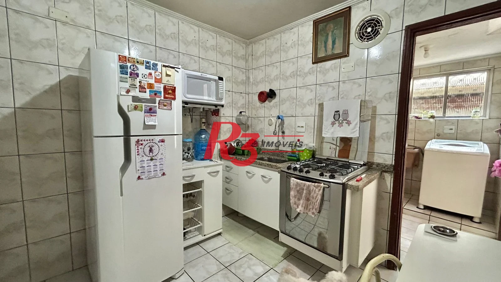Sobrado com 3 dormitórios à venda, 121 m² por R$ 480.000,00 - Macuco - Santos/SP