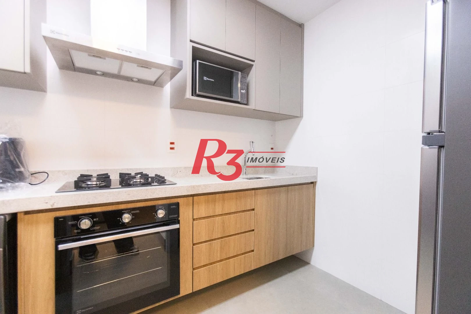 Apartamento com 1 suíte para alugar, 54 m² por R$ 6.100/mês - Boqueirão - Santos/SP