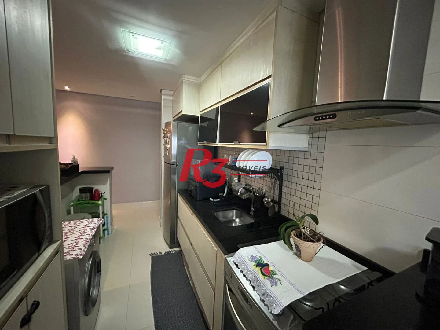 Apartamento com 3 dormitórios à venda, 77 m² por R$ 750.000,00 - Ponta da Praia - Santos/SP