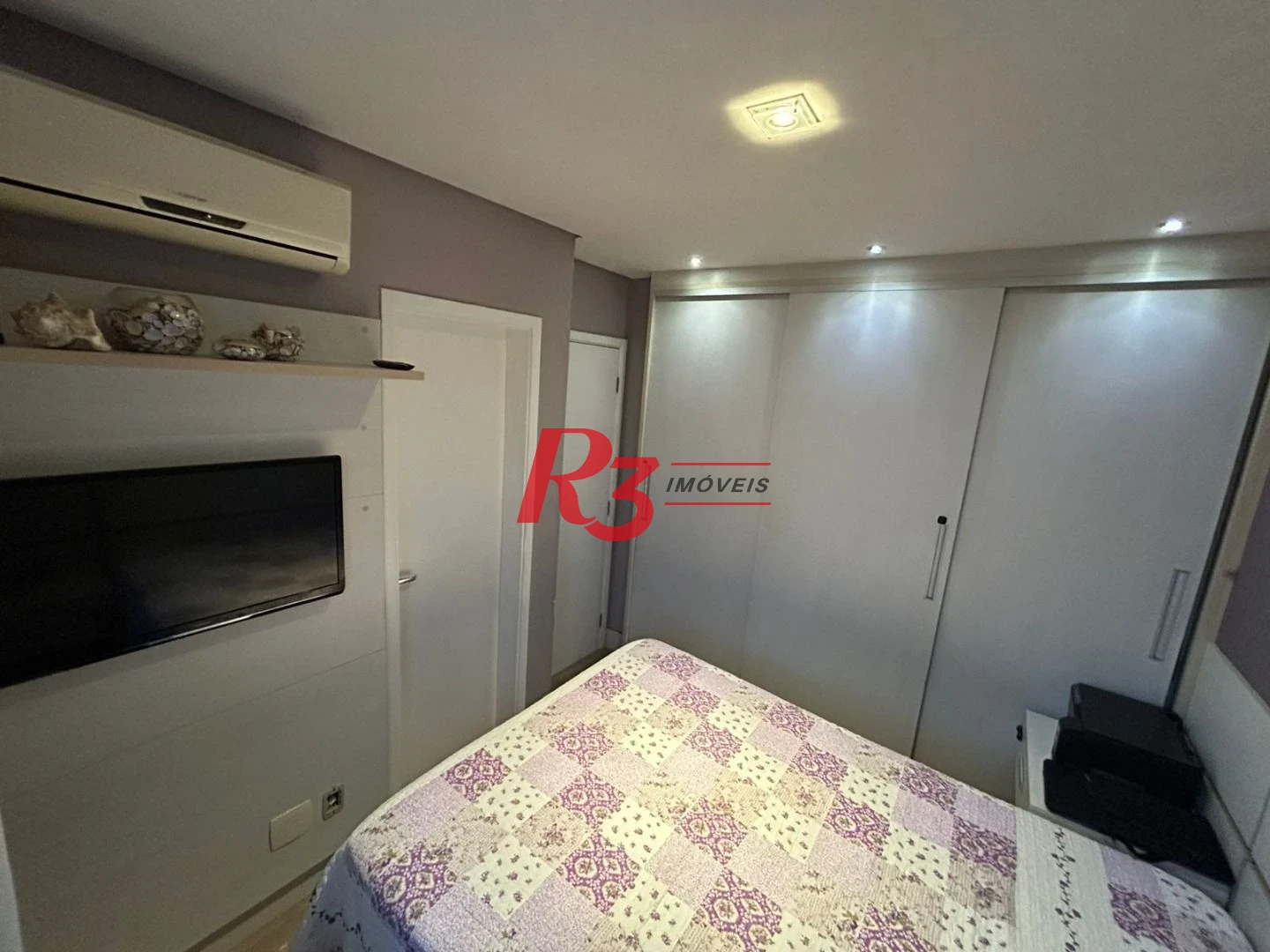 Apartamento com 3 dormitórios à venda, 77 m² por R$ 750.000,00 - Ponta da Praia - Santos/SP
