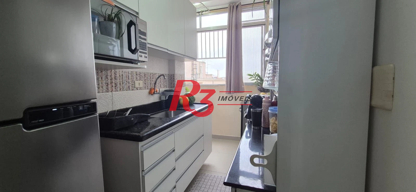 Apartamento com 2 dormitórios à venda, 56 m² por R$ 650.000,00 - Aparecida - Santos/SP