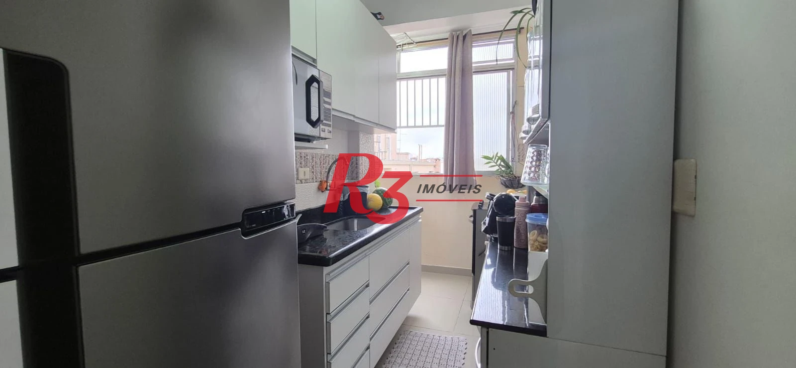 Apartamento com 2 dormitórios à venda, 56 m² por R$ 650.000,00 - Aparecida - Santos/SP