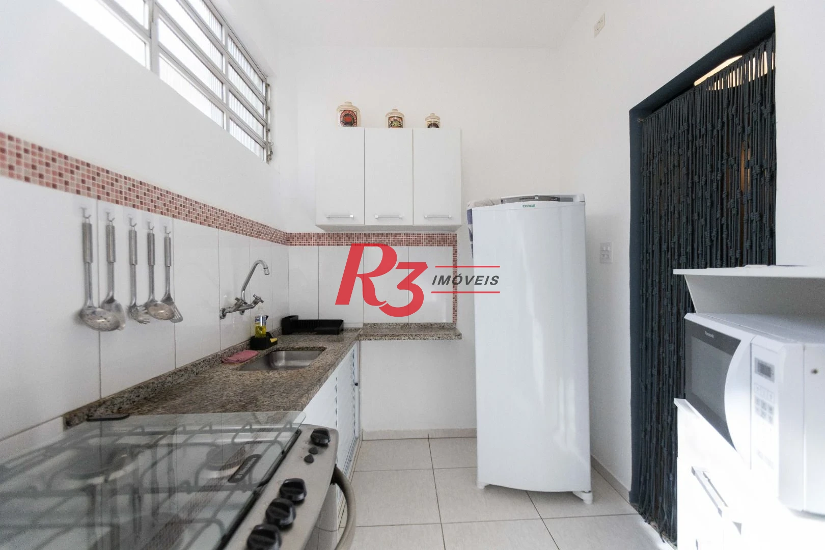 Apartamento com 1 dormitório para alugar, 68 m² por R$ 5.000,02/mês - José Menino - Santos/SP