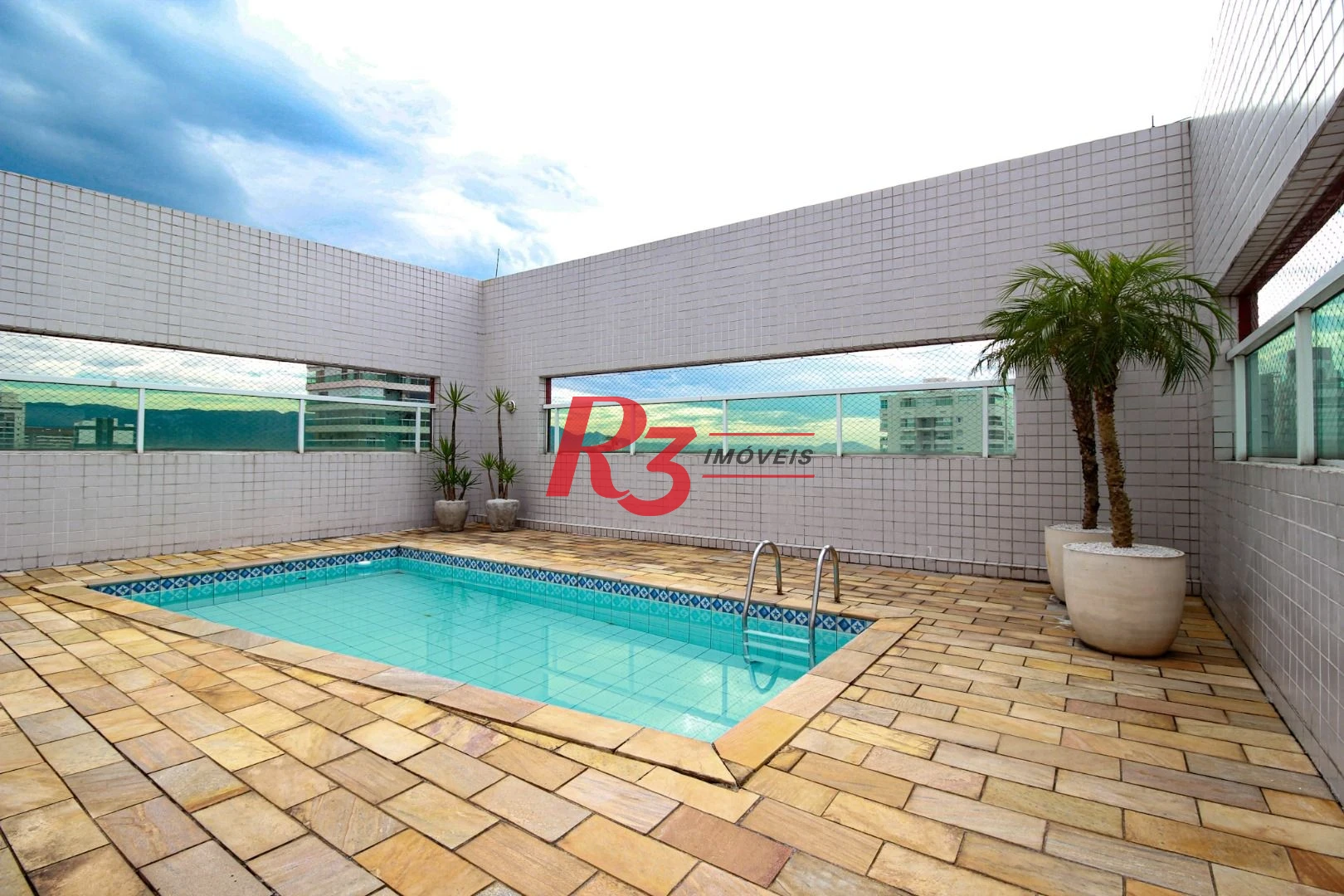 Apartamento com 3 dormitórios à venda, 105 m² por R$ 999.900,00 - Gonzaga - Santos/SP