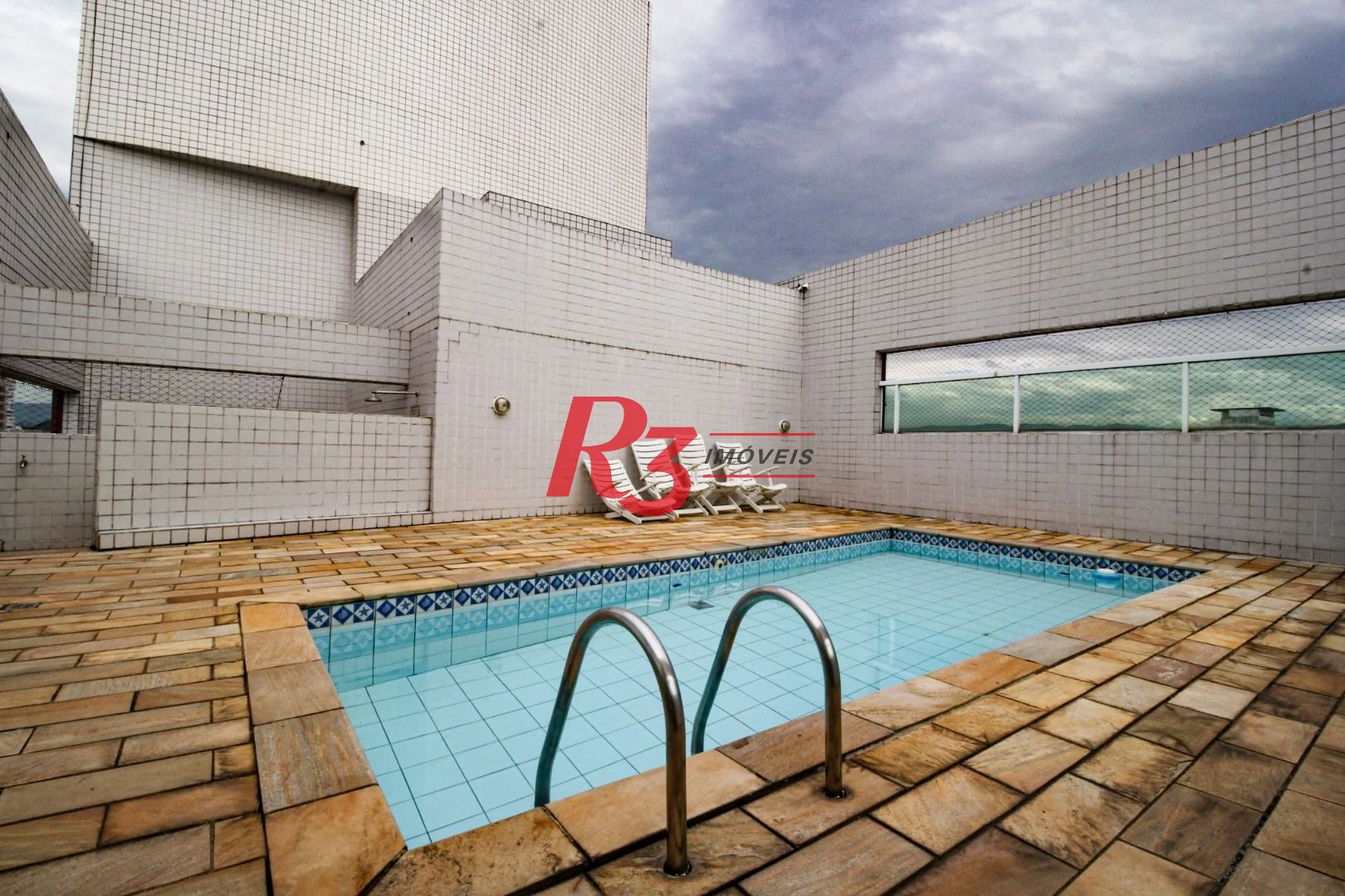 Apartamento com 3 dormitórios à venda, 105 m² por R$ 999.900,00 - Gonzaga - Santos/SP