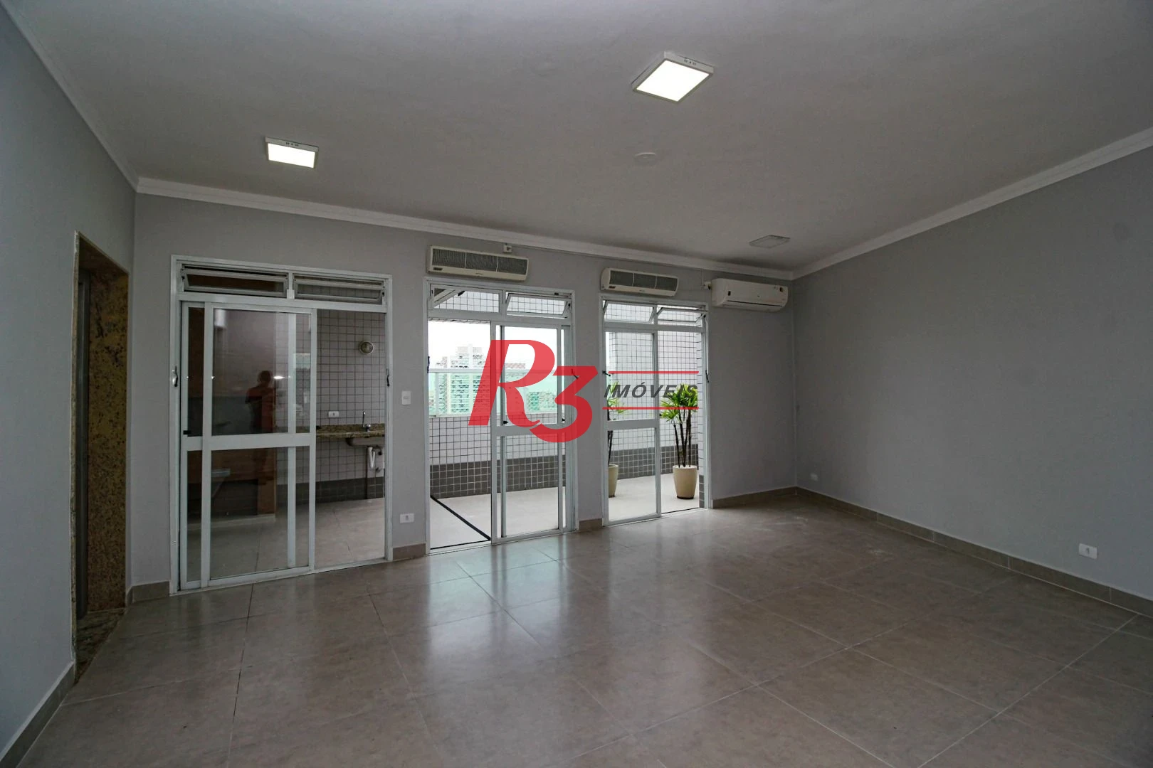 Apartamento com 3 dormitórios à venda, 105 m² por R$ 999.900,00 - Gonzaga - Santos/SP